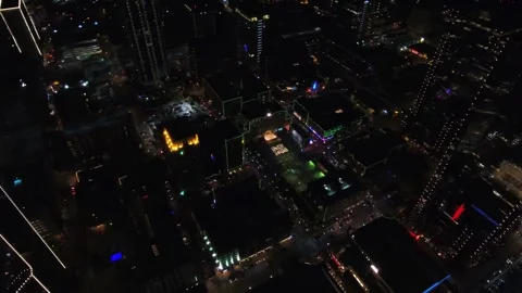 Night drone view over downtown Fort Worth Texas showing cityscape lights Stock Footage 344790548
