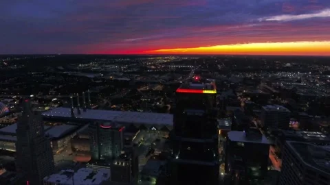 Night drone view over downtown Kansas City Missouri with glowing skyscrapers Stock Footage 344794443