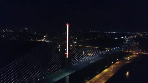 Night drone view over Veterans Glass City Skyway on Maumee River Toledo Ohio Stock Footage 344718315