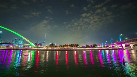 Night dubai canal reflection downtown crossing bridge panorama 4k time lapse uae Stock Footage 172433082