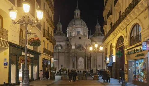 Night at El Tubo city center commercial street to Basilica Pilar in Zaragoza Stock Photos