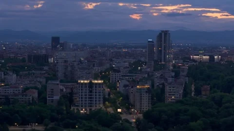 Night falling over Sofia city skyline with street lights Stock Footage 340012144