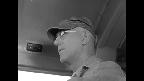 As night falls, the pullman porter prepares beds for passengers, and the Stock Footage 83140469