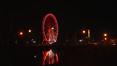Night Ferris wheel reflection on water, Gdansk Video stock 338324769