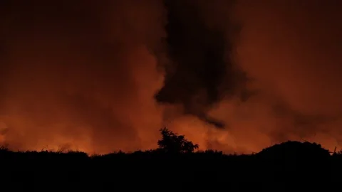 Night fire in the landfill Stock Footage 87340401