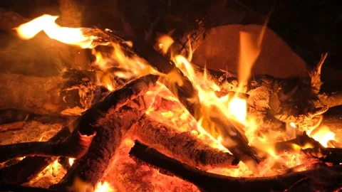 The night fire sparkles and creates a warm mood and comfort Stock Footage 193992796