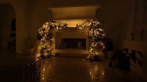 Night fireplace in a large house decorated with a Christmas tree and toys Stock Footage 164485111