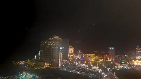 Night fireworks over Chatan town skyline in Okinawa, Japan Stock Footage 325628622