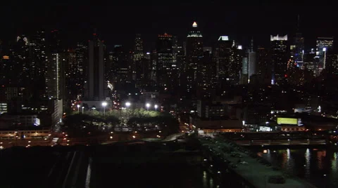 Night flight along Hudson River, looking east over Manhattan. Shot in 2005. Stock Footage 59522988