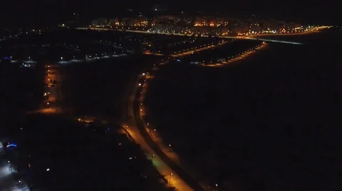 Night flight over the road winter city Stock Footage 71798845