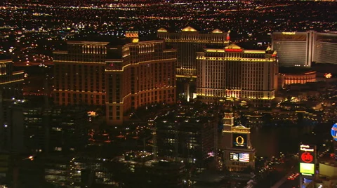 Night flight past the Bellagio and its neighbors on Las Vegas Boulevard. Shot in Stock Footage