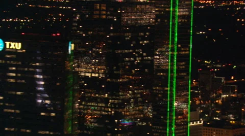 Night flight past skyscrapers of Dallas, Texas Stock Footage