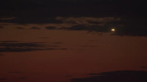 Night flight under clouded skies Stock Footage 268236779
