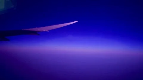 Night flight. View of the beautiful sky from the airplane window. Stock Footage 302884723