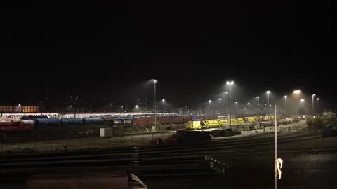 Night freight trains in rail yard Stock Footage 323265968