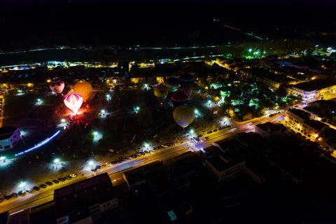 Night glow hyperlapse of hot air baloons Stock Footage 196747032