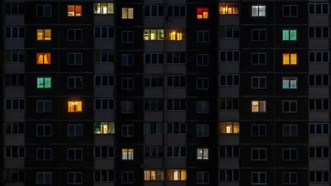 Night gradual rhythmic light in windows of multistory building and blinking Stock Footage 195636282