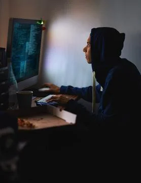 Night, hacker or man with computer, tech or typing with server or programmer Foto stock