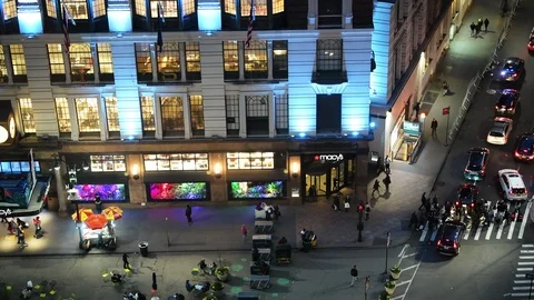 Night at Herald square, New York City, Macy's store, people walking on street Stock Footage 100515129