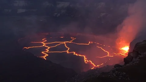 Night high angle shot over the Summit Vent Lava lake on Kilauea volcano Stock Footage 90106838