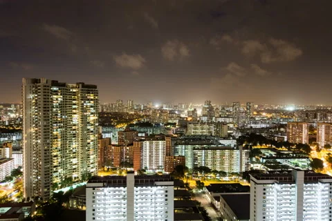 Night high angle toa payoh hdb flats building lights home condo trevista Stock Footage 152778135