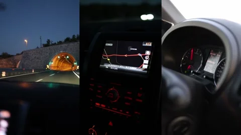 Night highway drive with GPS navigation dashboard and illuminated road tunnel Stockbeeldmateriaal 341622927