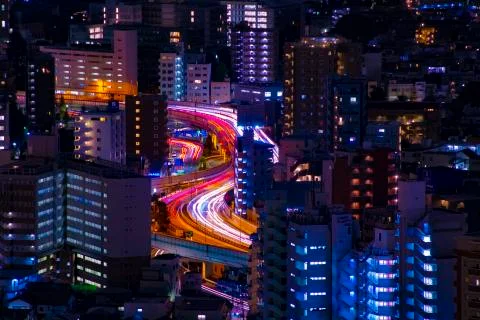 A night highway at the urban city in Tokyo long shot Stock Photos