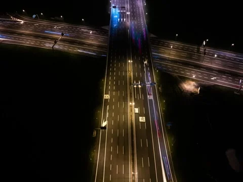 Night hyperlapse of aerial view of highway crossroad Stock Footage 320845234