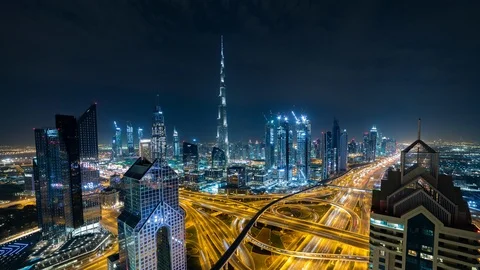 Night hyperlapse timelapse of dubai skyscrappers with Burj Khalifa in background Stock Footage