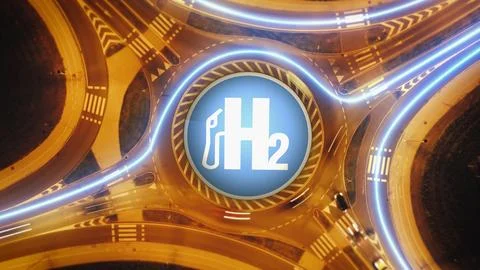 Night Hyperlapse of traffic at a roundbound with a H2 symbol Stock Photos