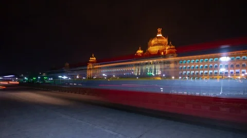 Night illuminated bangalore palace traffic street square 4k timelapse india Stock Footage