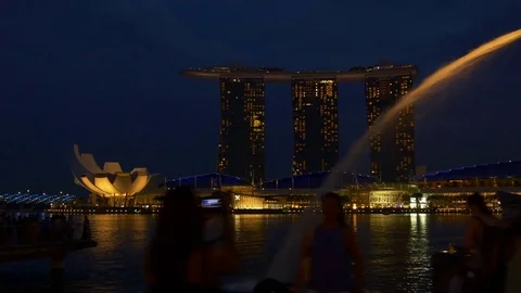 Night illuminated singapore city famous hotel bay fountain panorama 4k Stock Footage