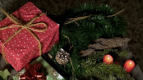Night image of coffee table with authentic Chrismas decoration and lit candles. Stock Footage 102658044