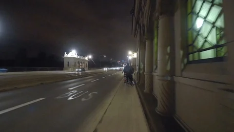 Night inline skating on bridge Stock Footage 120750160