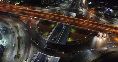 Night intersection circular city transport road with vehicle transport light Stock Footage 128338012