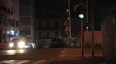 Night intersection in city of Catania, Sicily. Cars, traffic lights. Stock Footage 49011032