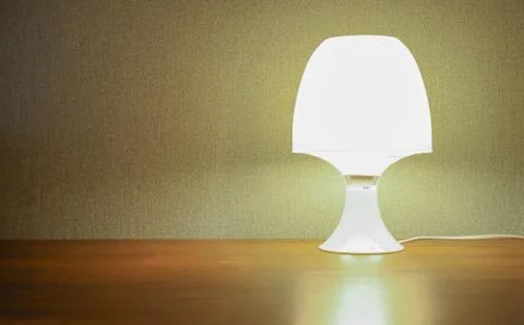 Night lamp on the table. Stock Photos