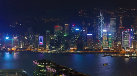 Night light city panoramic scape 4k time lapse from hong kong bay Stock Footage 46548786
