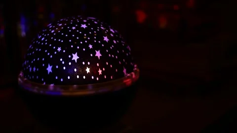 Night Light Projector Series - Spinning Projector Star Lamp 1 - Angle 1 Stock Footage 285685679