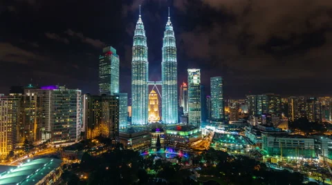 Night light sky towers panorama 4k time lapse from kuala lumpur city Stock Footage 46549953