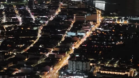 Night light trails over George Town aerial drone view Stock Footage 332248621