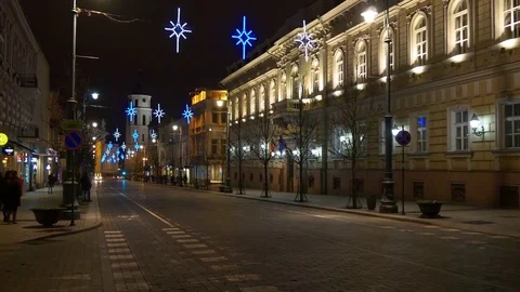 Night light vilnius city center street walking panorama 4k lithuania Stock Footage