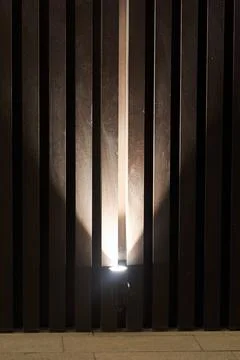 Night lighting of decorative elements of the cafe wall Stock Photos