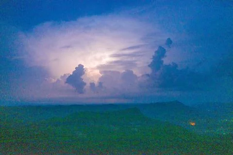 Night lightning storm above mountain silhouettes Stock Photos