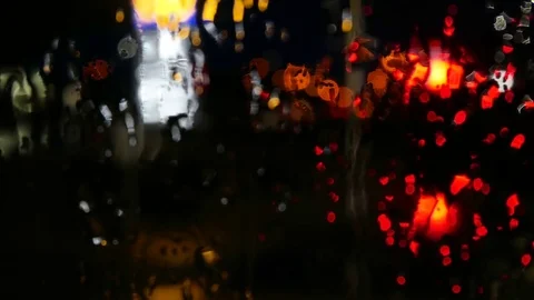 Night lights from raining windows Stock Footage 79628493