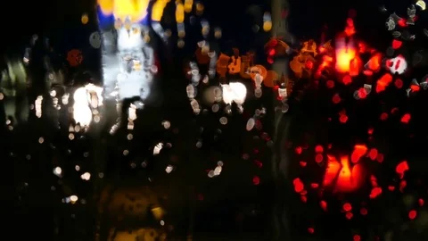 Night lights from raining windows 動画素材 79628494