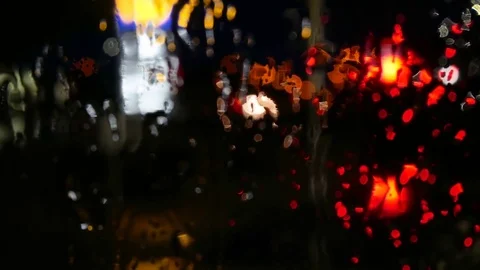 Night lights from raining windows Stock Footage 79628499