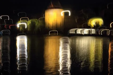 Night lights reflected on water Stock Photos