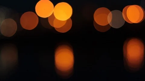 Night lights on the sea bokeh, reflection of the night sky in the water, boke Video stock 128448495