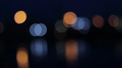 Night lights on the sea bokeh, reflection of the night sky in the water, boke Video stock 128448881